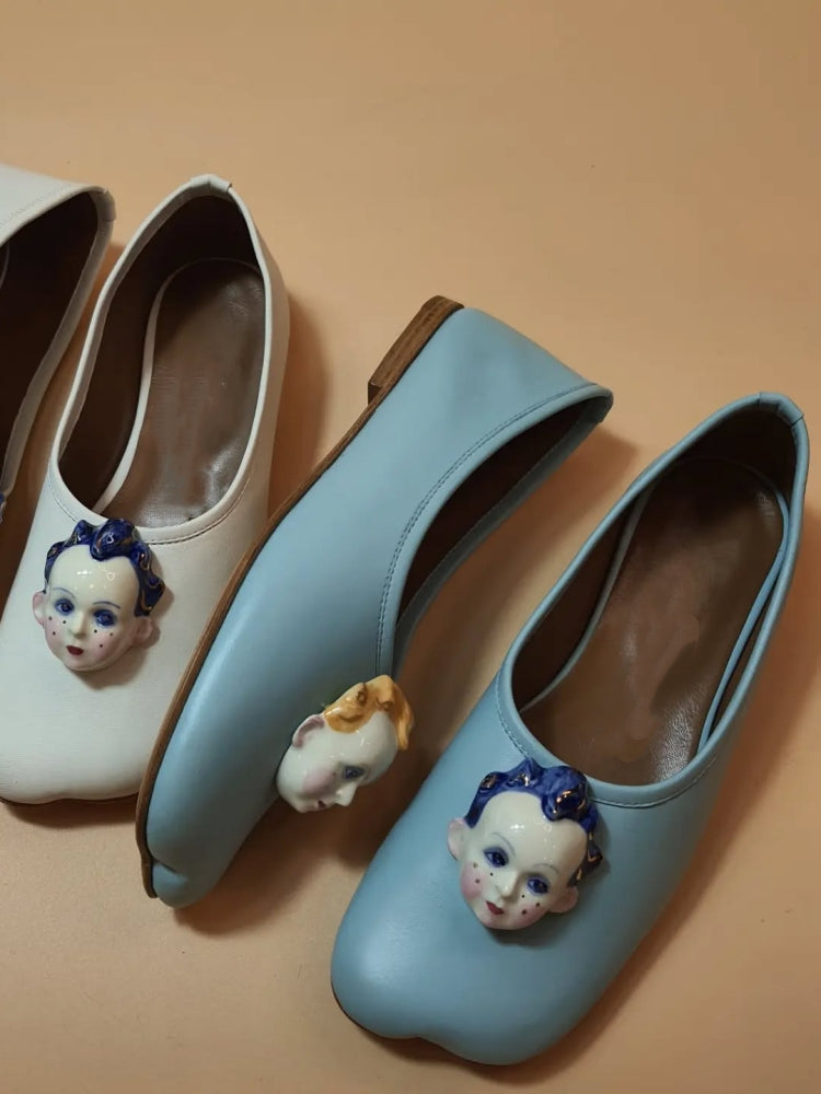 Leather Slip-On Shoes With Ceramic Face Embellishments
