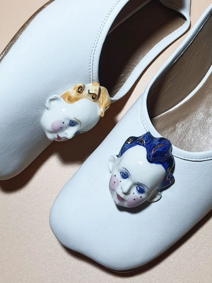 Leather Slip-On Shoes With Ceramic Face Embellishments