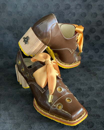 Curved-heel Lattice Boots With Ribbon Detail