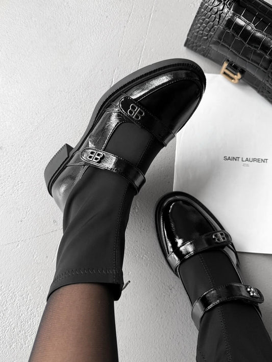 Black Patent Leather Boots With Straps And Buckle Details