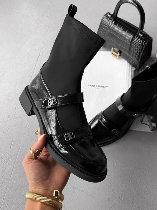 Black Patent Leather Boots With Straps And Buckle Details